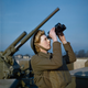 An Auxiliary Territorial Service (ATS) “spotter” at a 3.7-inch anti-aircraft gun site, December 1942 (Imperial War Museum)